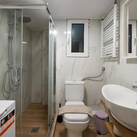 Апартаменты Ikos Spacious